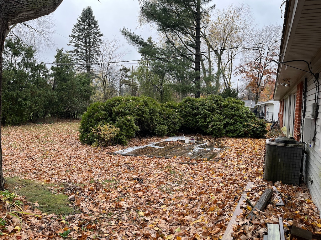 view of yard featuring central AC unit