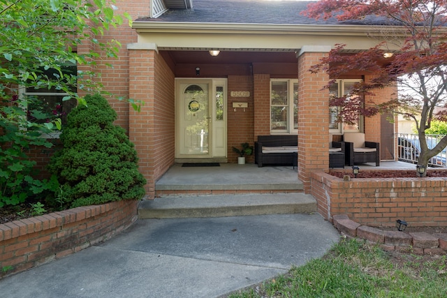 doorway to property with covered porch