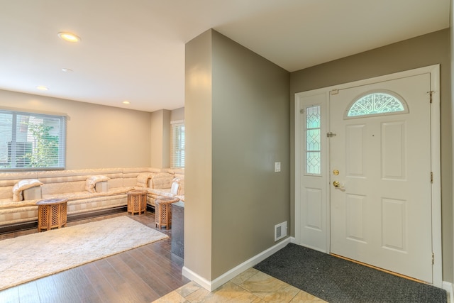 foyer with light hardwood / wood-style flooring