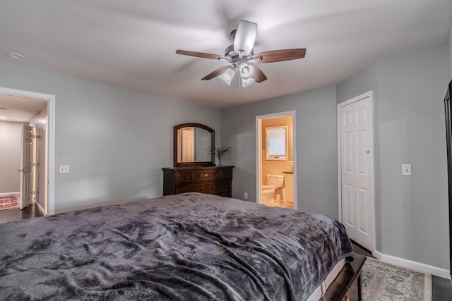 bedroom featuring ensuite bathroom and ceiling fan