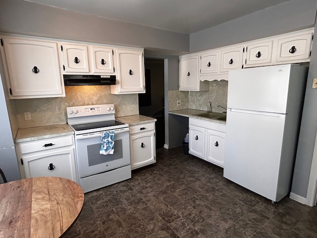 kitchen featuring white cabinetry, white appliances, sink, and decorative backsplash