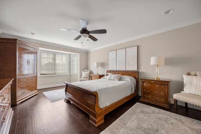 bedroom featuring ceiling fan, crown molding, and dark wood-type flooring