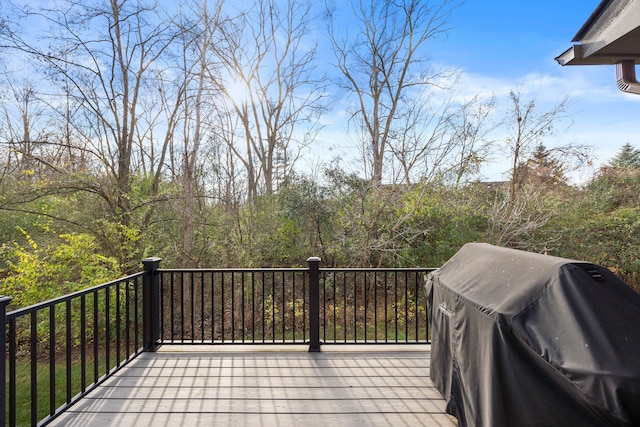 wooden deck with grilling area