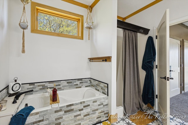 bathroom with tiled bath and crown molding