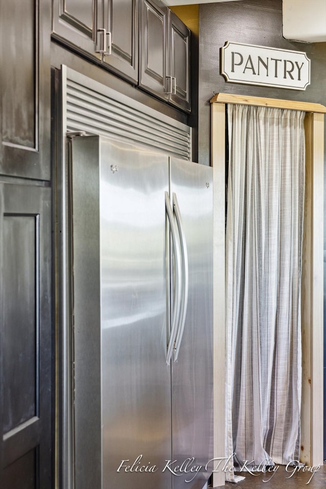 kitchen featuring stainless steel refrigerator