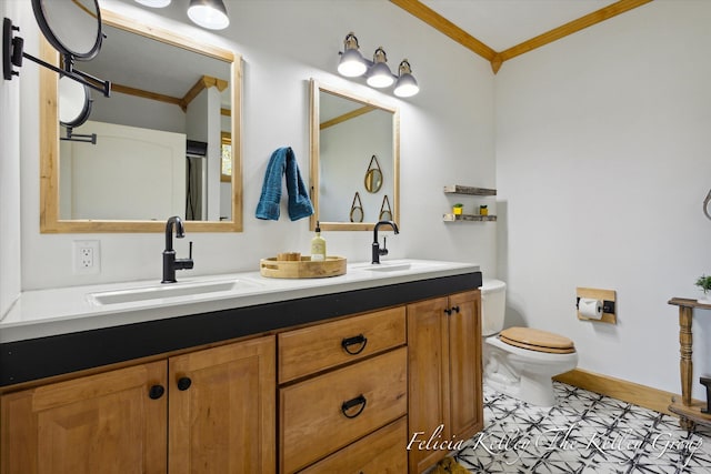 bathroom with tile patterned floors, toilet, vanity, and ornamental molding