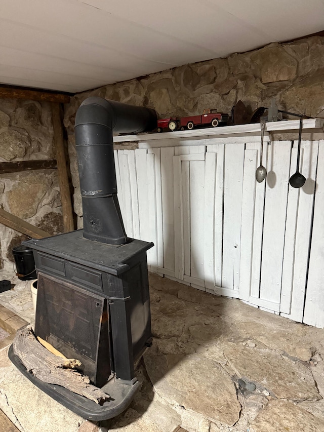 interior space with a wood stove