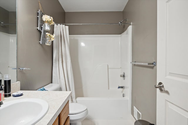 full bathroom with tile patterned floors, vanity, shower / bath combo, and toilet