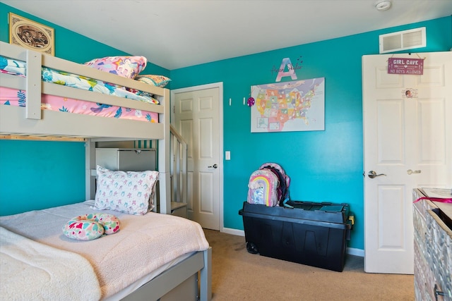 bedroom with light carpet