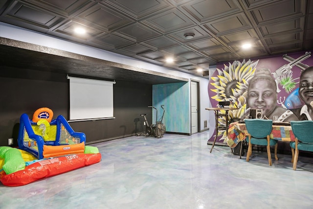 rec room featuring concrete flooring