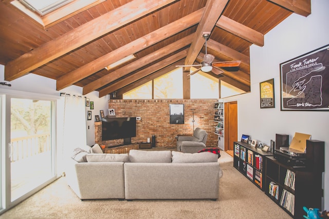 carpeted living room with ceiling fan, lofted ceiling with beams, and wood ceiling