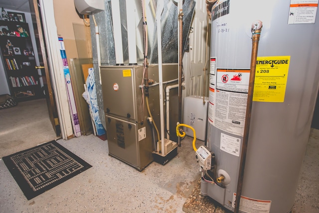 utility room with heating unit and gas water heater