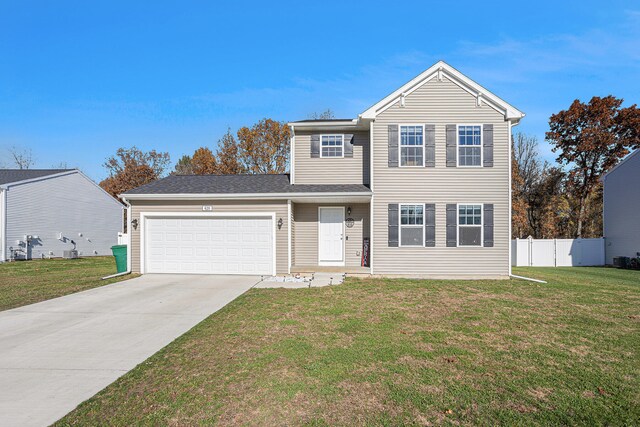 front facade with a garage and a front lawn