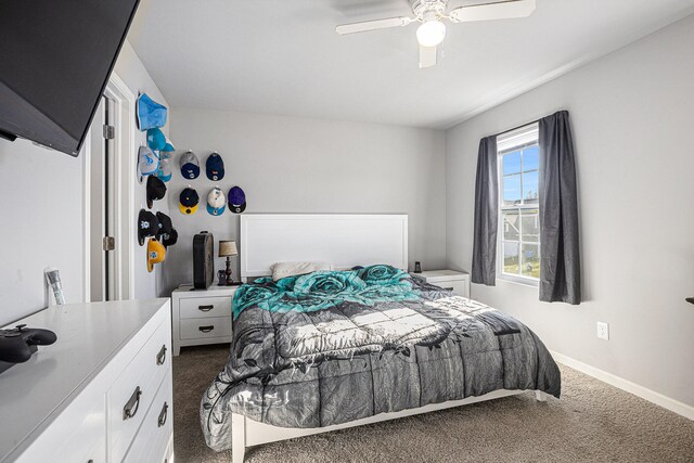 carpeted bedroom featuring ceiling fan