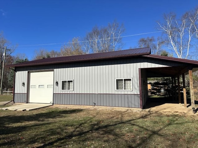 exterior space with a lawn and a garage