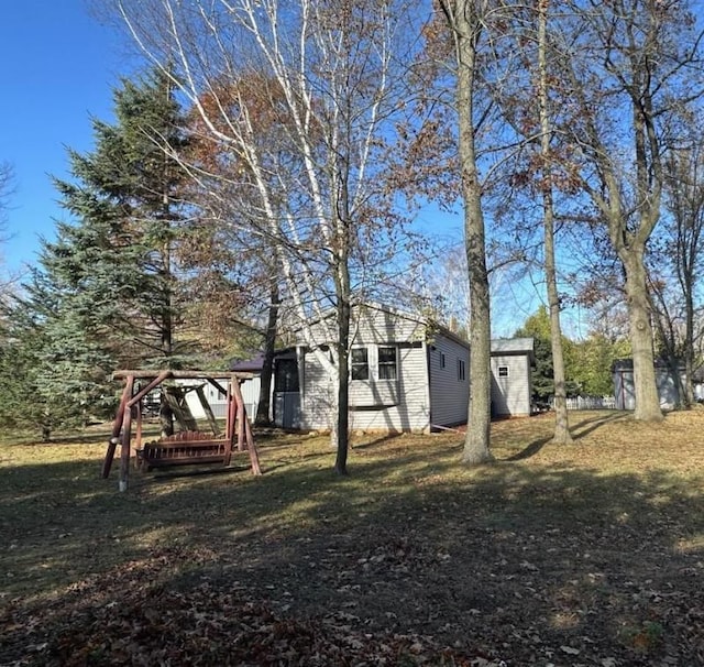 2965 Pointe Aux Barques Rd, Port Austin, MI 48467 - view of yard featuring a wooden deck