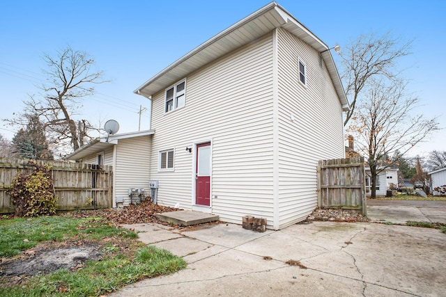 back of house featuring a patio