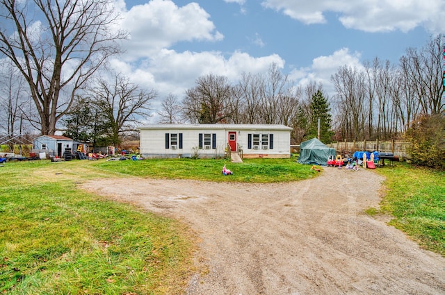 view of front of home with a front lawn