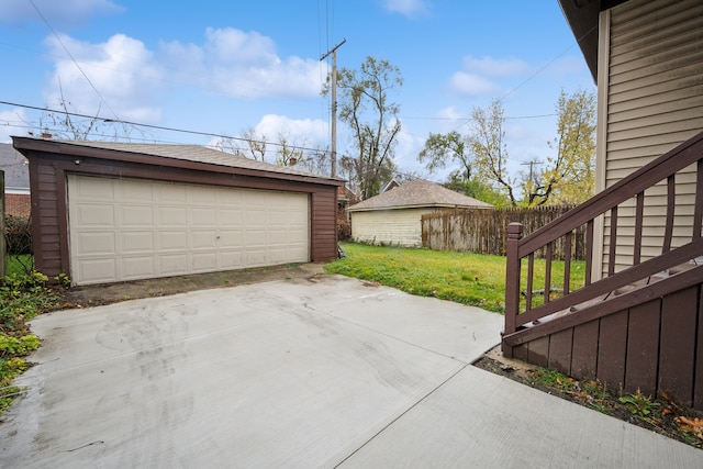 garage with a yard