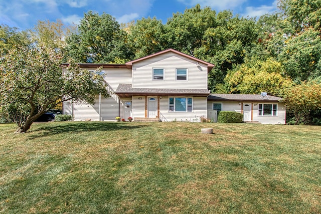 view of property featuring a front yard