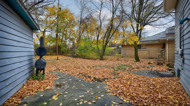 view of yard with a patio and a fenced backyard