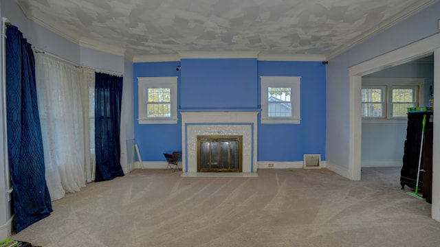 unfurnished living room with a wealth of natural light, a fireplace with flush hearth, and ornamental molding