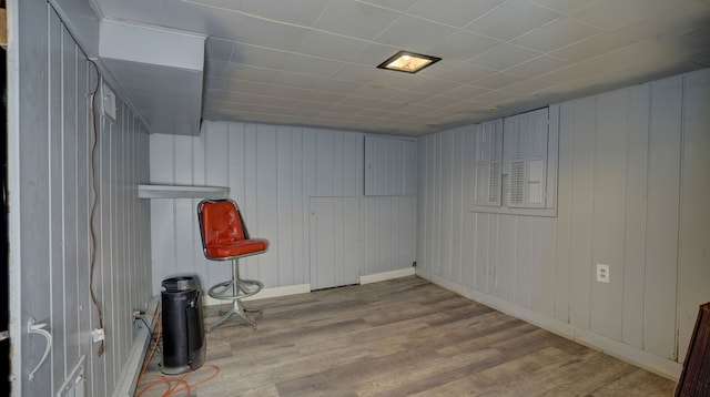 basement featuring light hardwood / wood-style flooring