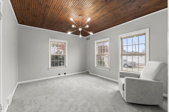 sitting room featuring wooden ceiling, light carpet, a wealth of natural light, and a chandelier