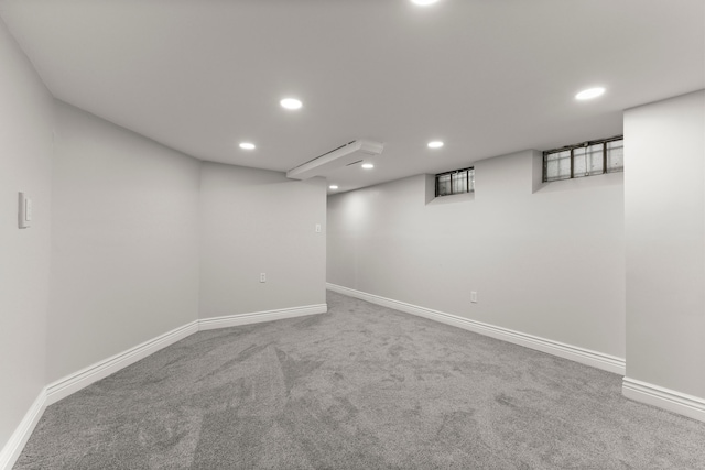 basement featuring carpet flooring