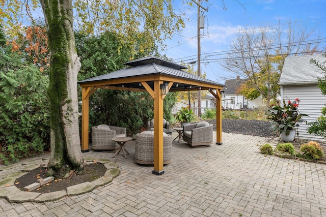 view of patio / terrace featuring outdoor lounge area and a gazebo