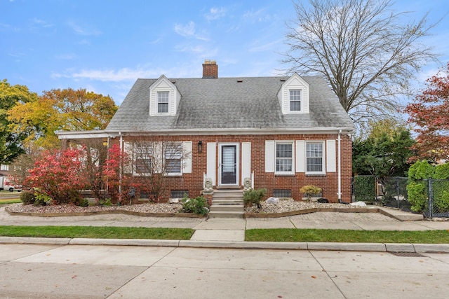 view of new england style home