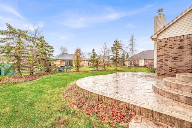 view of yard with a patio area