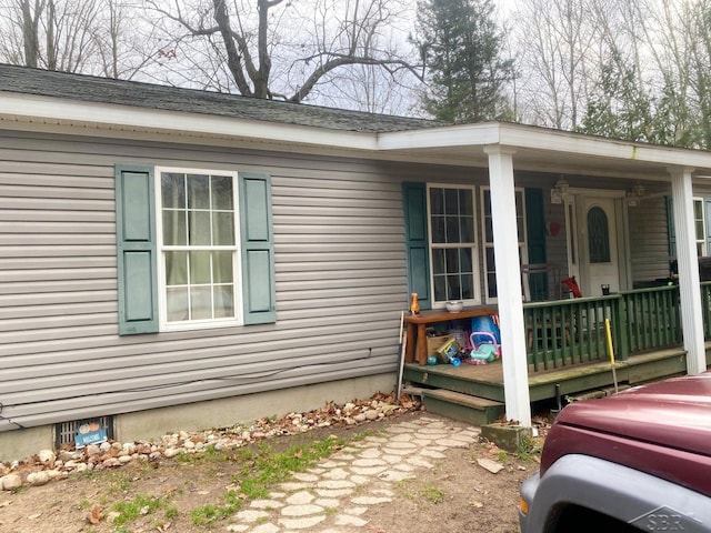 view of home's exterior with a porch