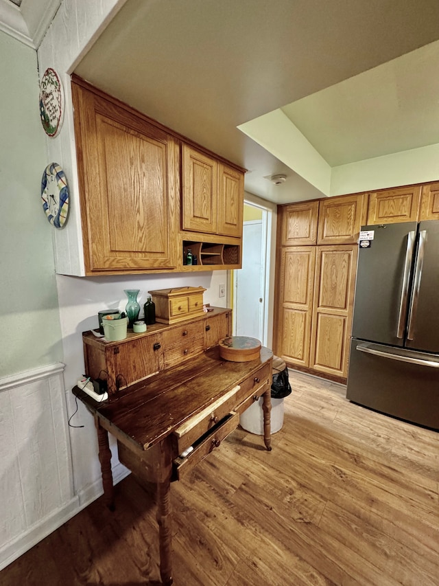 kitchen featuring stainless steel refrigerator and light wood-type flooring