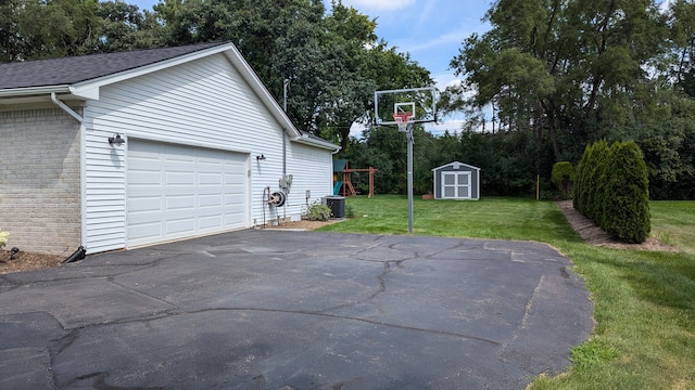 exterior space with a playground and a yard