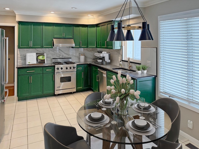 kitchen featuring tasteful backsplash, light tile patterned floors, sink, pendant lighting, and stainless steel appliances