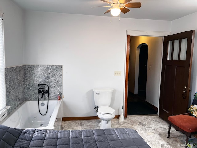 2360 Virginia Ave, Saginaw, MI 48601 - bathroom with ceiling fan and a tub with jets