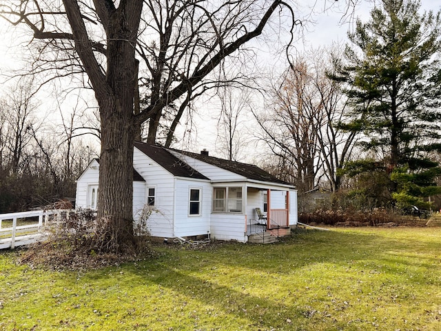 exterior space with a yard