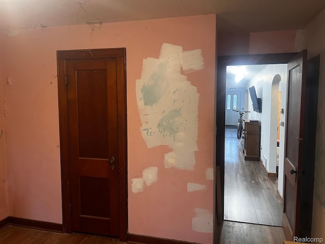 2360 Virginia Ave, Saginaw, MI 48601 - corridor with wood finished floors and arched walkways