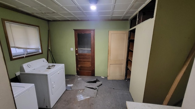 laundry room with washing machine and clothes dryer