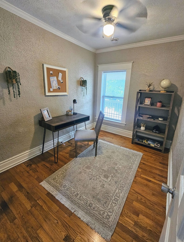 home office featuring a textured ceiling, dark hardwood / wood-style flooring, ceiling fan, and ornamental molding