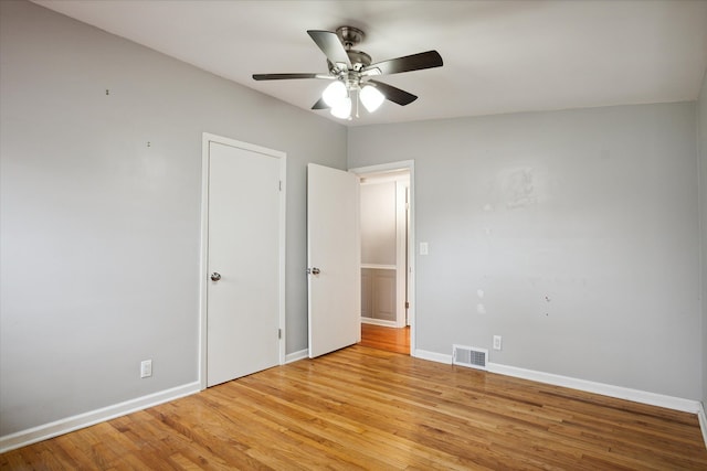 unfurnished bedroom featuring light hardwood / wood-style floors and ceiling fan