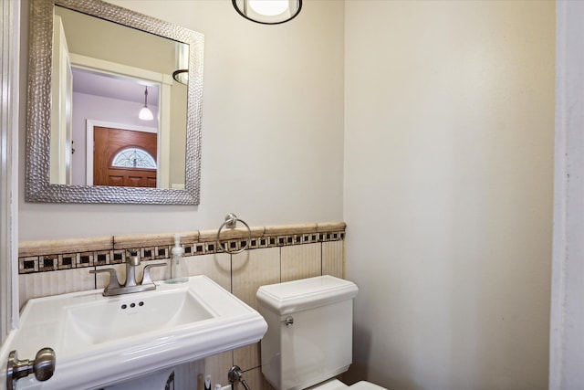 bathroom with toilet and sink