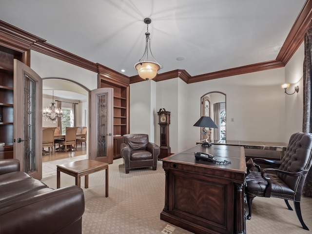 office area with a chandelier, french doors, light colored carpet, and ornamental molding