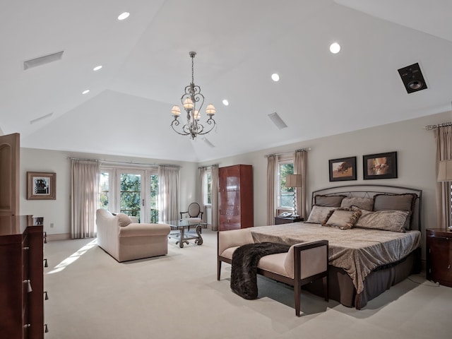 carpeted bedroom with lofted ceiling and an inviting chandelier