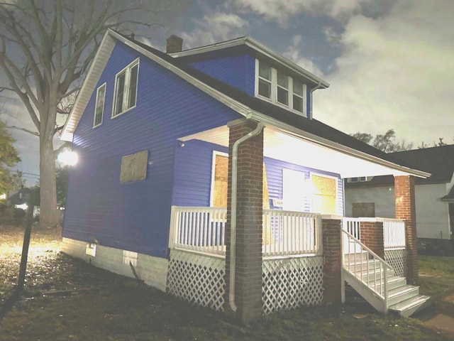 view of home's exterior featuring a porch