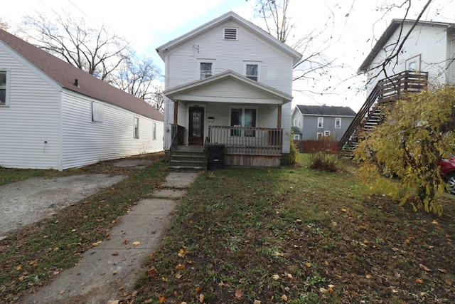 view of front of home featuring covered porch