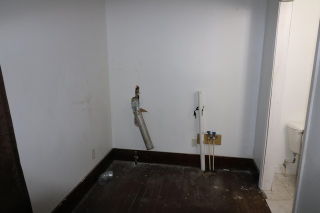 laundry room with light wood-type flooring