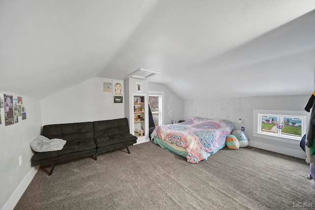 bedroom with carpet flooring and vaulted ceiling