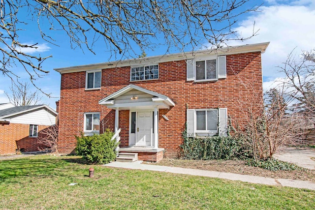 view of front of property with a front lawn